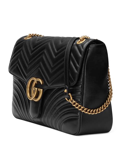 item 807169825 from gucci|GG Emblem large shoulder bag in black leather .